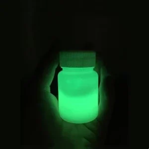 Luminous Powder Pigment in Dark Luminous Green Paint